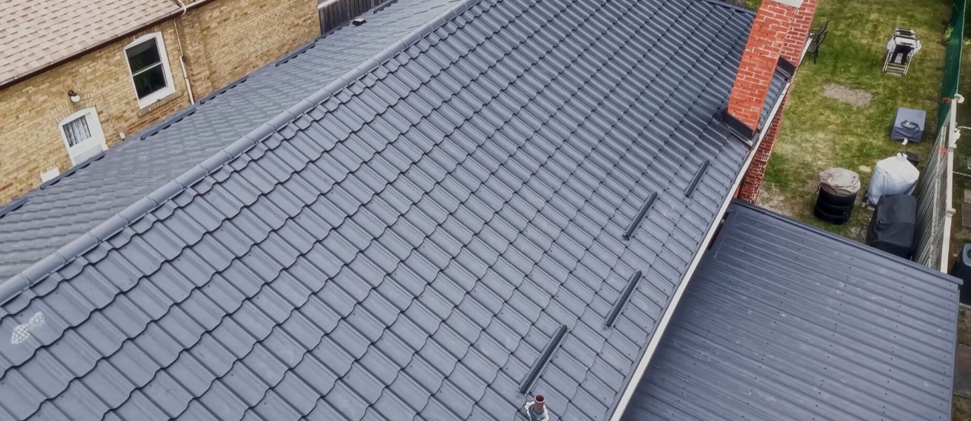 Residential roof with professionally installed gutter system in Cicero, IL